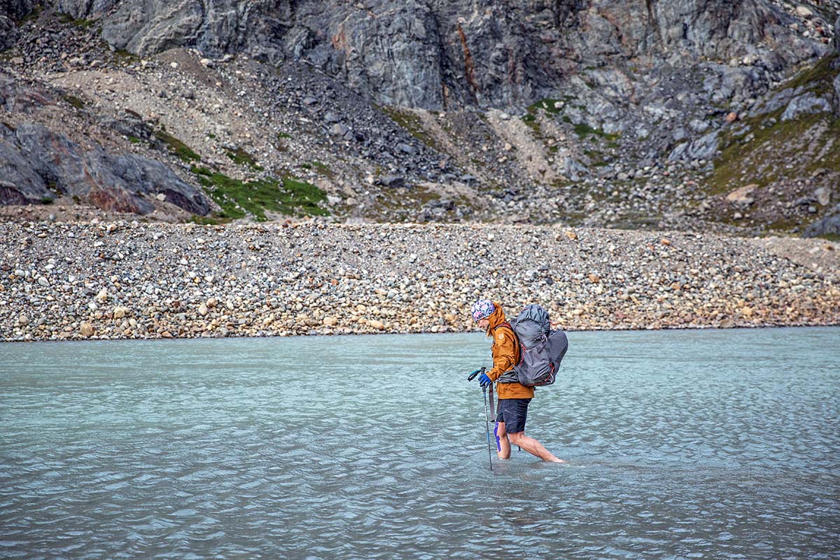 Walking in river in Patagonia (Fjallraven Keb Eco-Shell Jacket)
